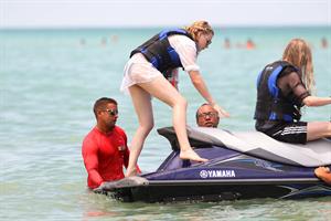Chloe Grace Moretz candids in a Black Bikini in Miami Beach
