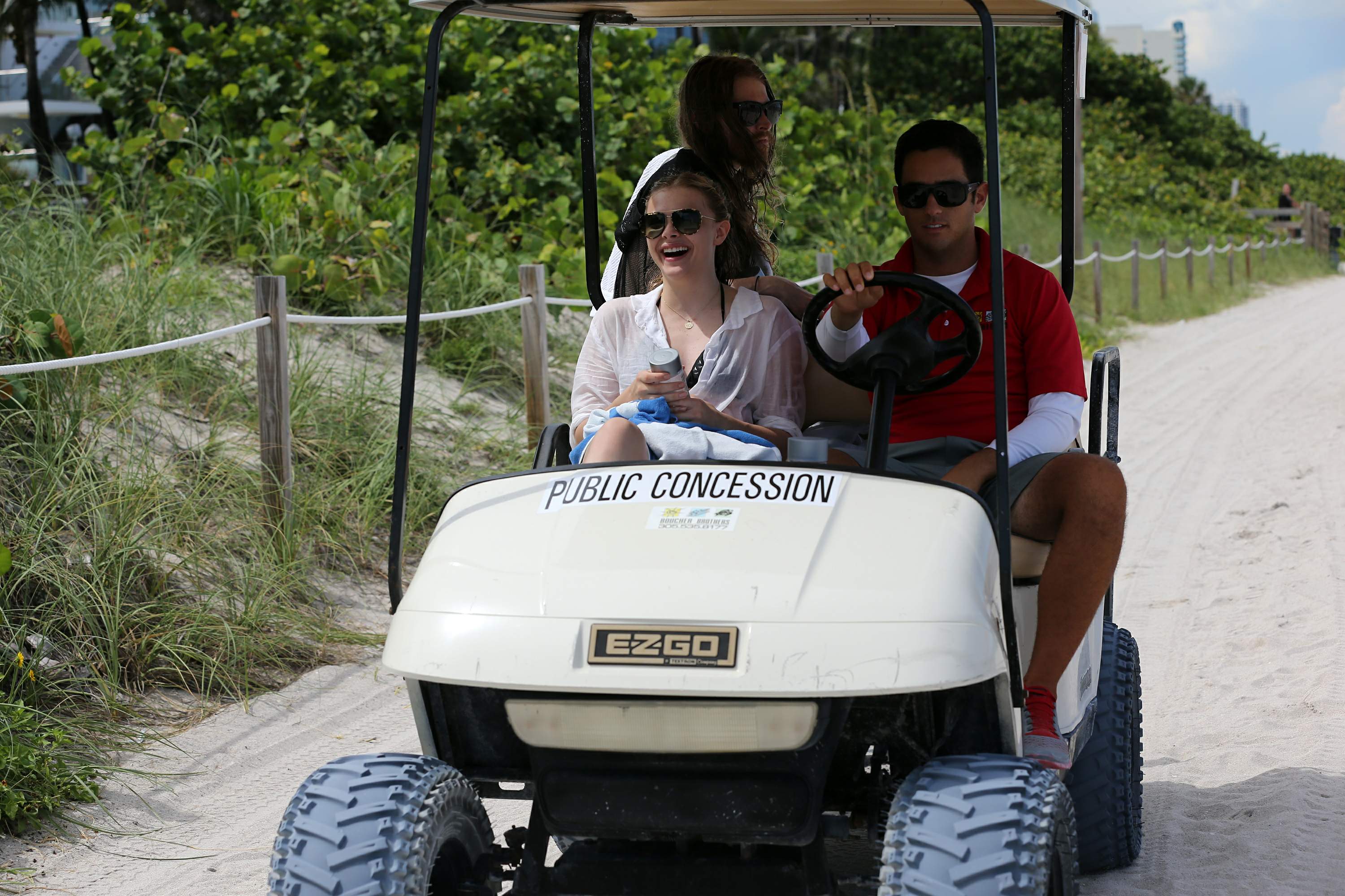 Chloe Grace Moretz candids in a Black Bikini in Miami Beach