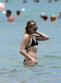 Chloe Grace Moretz candids in a Black Bikini in Miami Beach