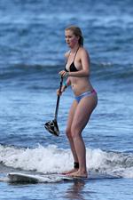 Ireland Baldwin goes paddle-boarding in Hawaii with her boyfriend Slater Trout May 26, 2013 