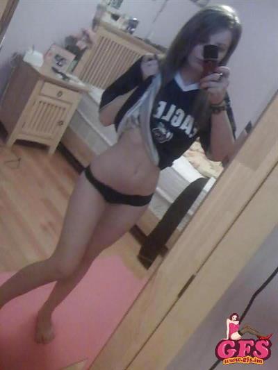 Anonymous in lingerie taking a selfie