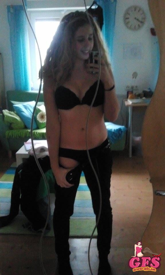 Anonymous in lingerie taking a selfie