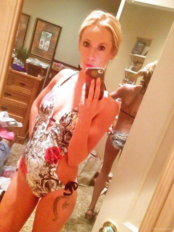 Anonymous in a bikini taking a selfie