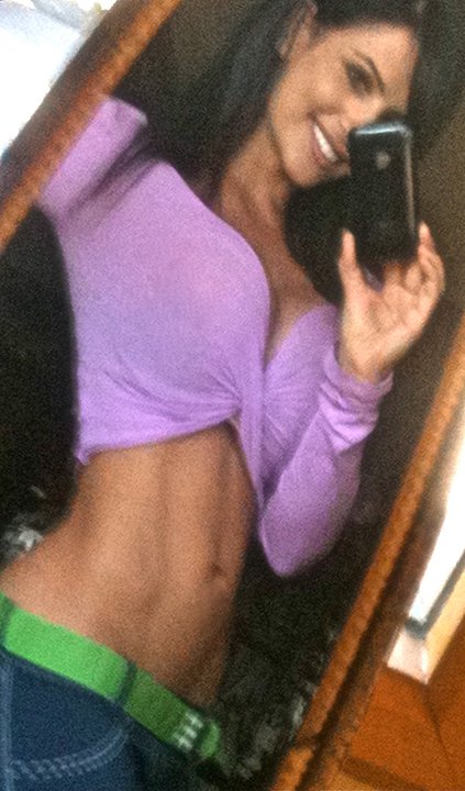 Denise Milani taking a selfie