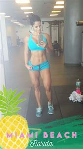 Michelle Lewin in a bikini taking a selfie