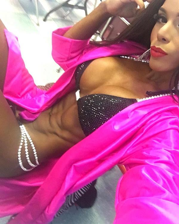 Yarishna Ayala Otero in a bikini taking a selfie