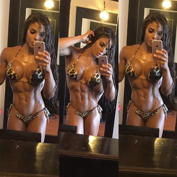 Yarishna Ayala Otero in a bikini taking a selfie