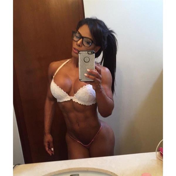 Yarishna Ayala Otero in lingerie taking a selfie