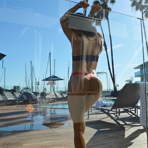 Jessica Arevalo in a bikini taking a selfie and - ass