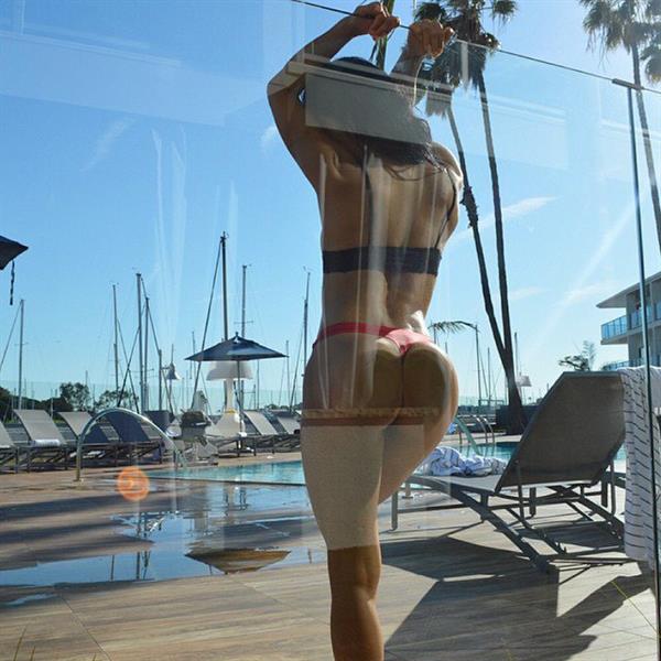 Jessica Arevalo in a bikini taking a selfie and - ass