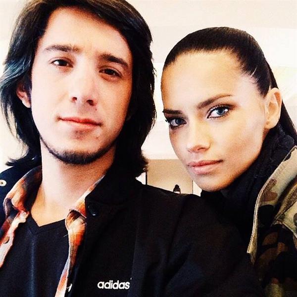 Adriana Lima taking a selfie