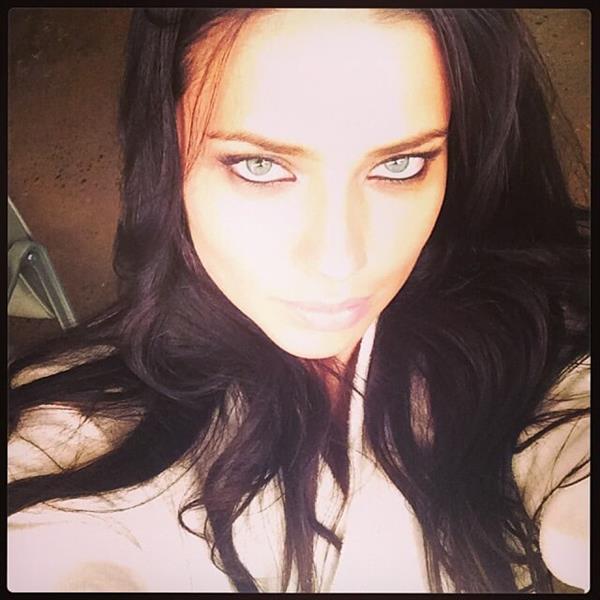 Adriana Lima taking a selfie