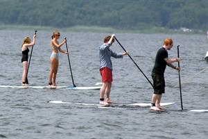 Taylor Swift paddleboarding in Westerly, Massachusetts 7/28/13 