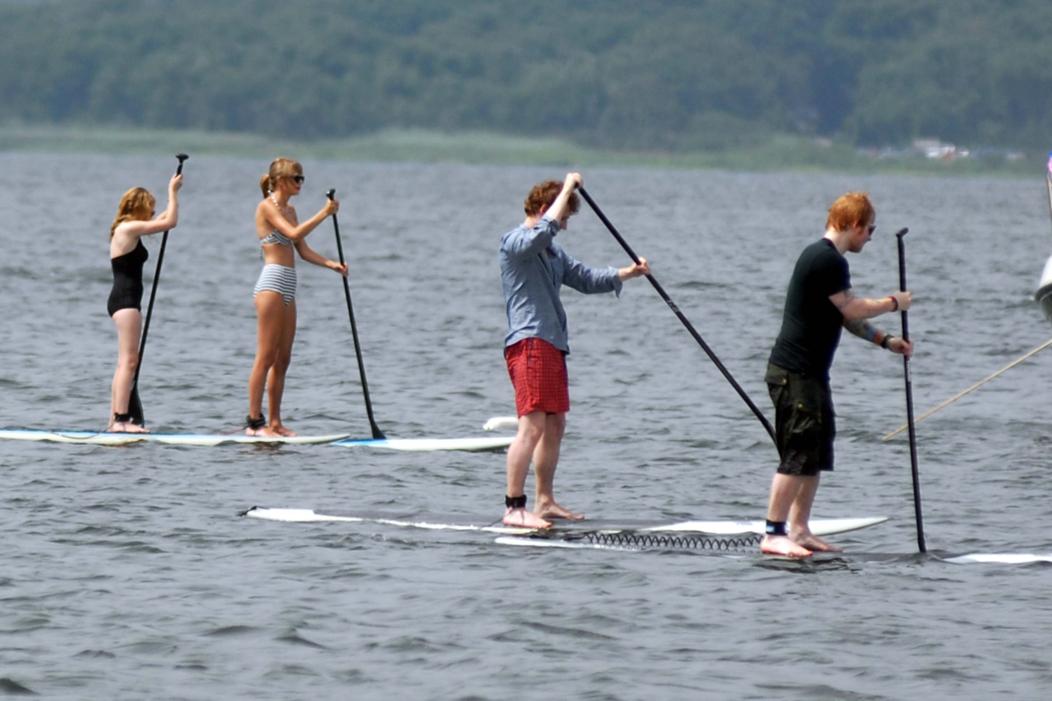 Taylor Swift paddleboarding in Westerly, Massachusetts 7/28/13 