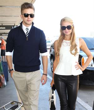 Paris Hilton Arrives at LAAirport in Los Angeles (September 6, 2013) 