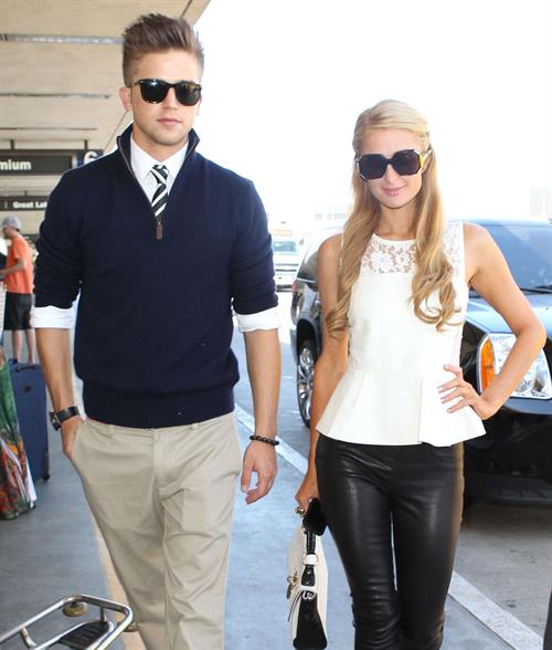 Paris Hilton Arrives at LAAirport in Los Angeles (September 6, 2013) 