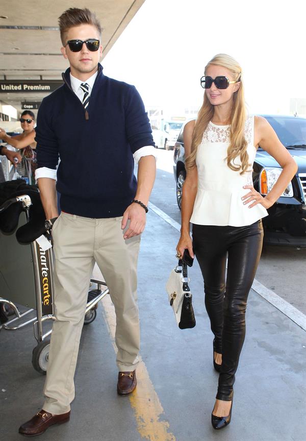 Paris Hilton Arrives at LAAirport in Los Angeles (September 6, 2013) 