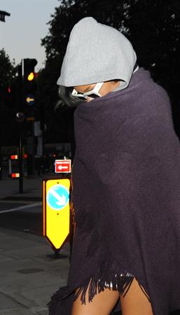 Rihanna - Covers her face while out in London (19.07.2013) 