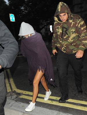 Rihanna - Covers her face while out in London (19.07.2013) 