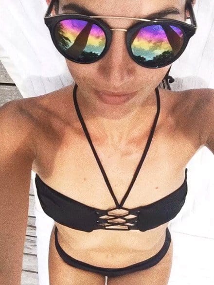 Lily Aldridge in a bikini taking a selfie