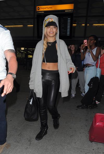Rita Ora catches a flight at Heathrow Airport in London (27.06.2013) 