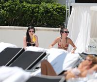 Selena Gomez in bikini by a hotel pool in Miami 5/11/13 