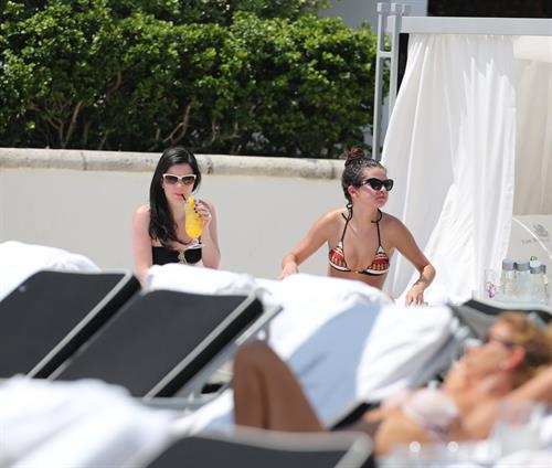 Selena Gomez in bikini by a hotel pool in Miami 5/11/13 