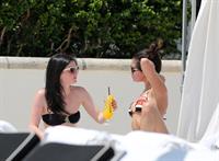 Selena Gomez in bikini by a hotel pool in Miami 5/11/13 