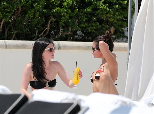 Selena Gomez in bikini by a hotel pool in Miami 5/11/13 