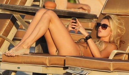 Abigail Clancy in a bikini - ass