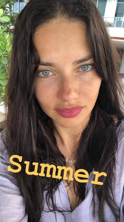 Adriana Lima taking a selfie