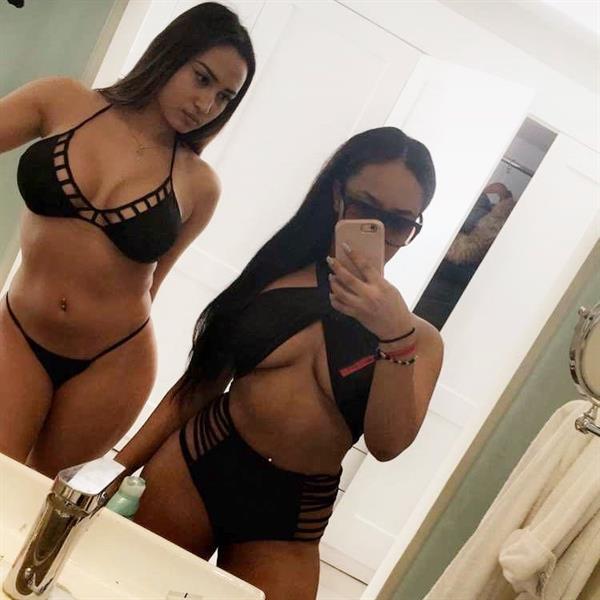 Astrid Nelsia in a bikini taking a selfie