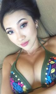 Mhaye Monti in a bikini taking a selfie