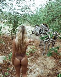 Sarah Kohan in a bikini - ass