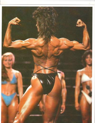 Rachel McLish in a bikini - ass