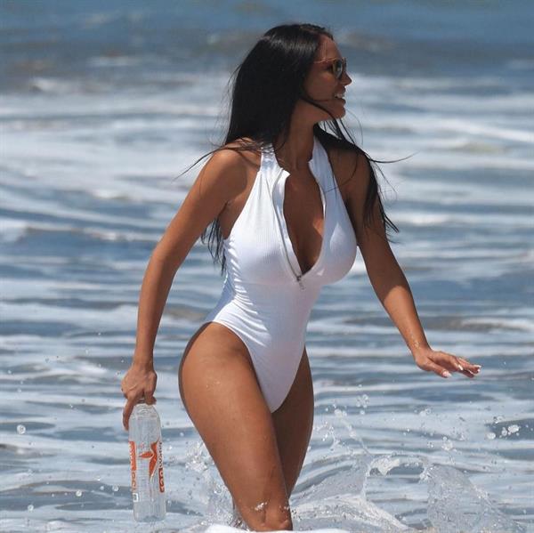 Charlie Riina in a beach photoshoot for 128 Water in Santa Monica on  11/25/2018