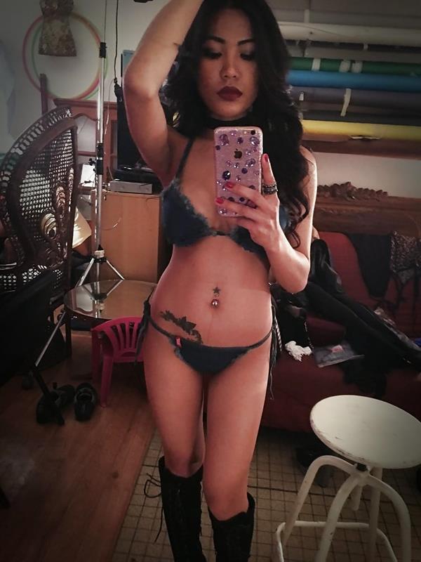 Poopea Pons in lingerie taking a selfie