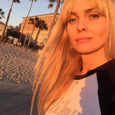 Izabella Scorupco taking a selfie