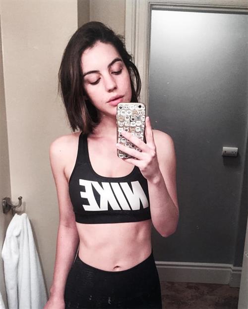 Adelaide Kane taking a selfie