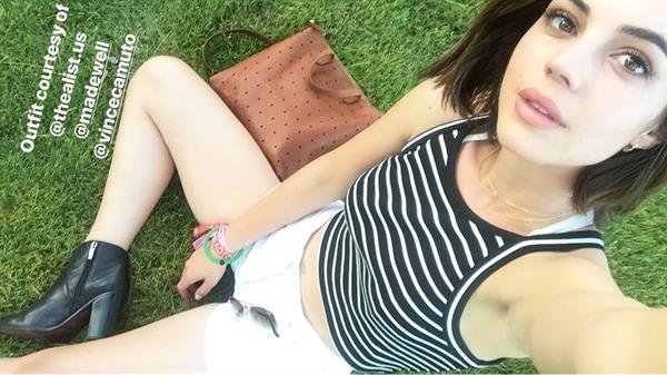 Adelaide Kane taking a selfie