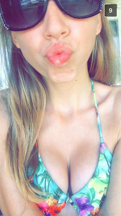 Anonymous in a bikini taking a selfie