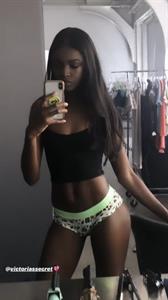Leomie Anderson in lingerie taking a selfie