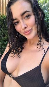 Sarah Stephens in a bikini taking a selfie