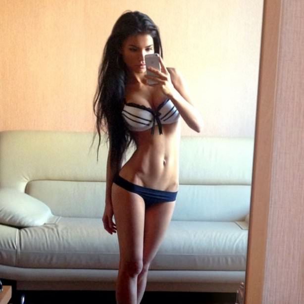 Svetlana Bilyalova in lingerie taking a selfie