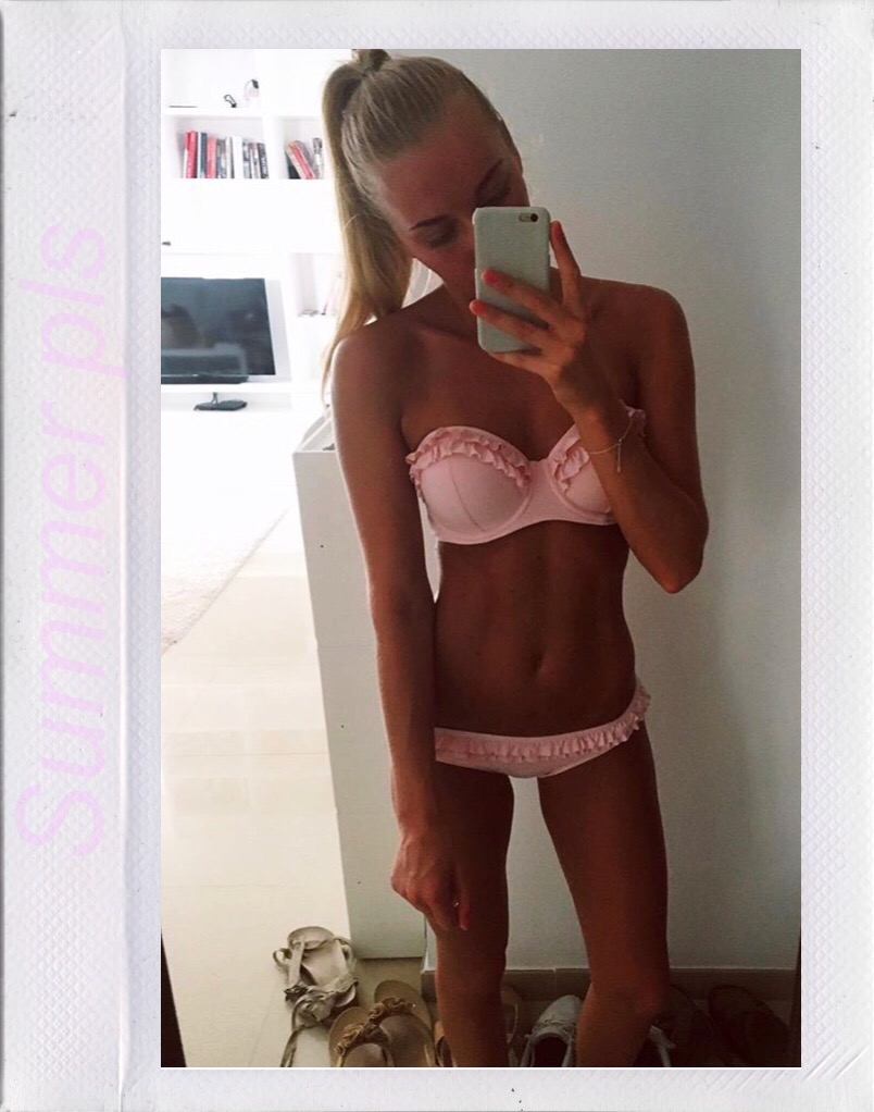 Anonymous in a bikini taking a selfie