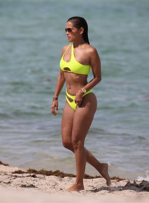 Rocsi Diaz in a sexy yellow bikini at the beach seen by paparazzi.










