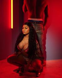 Nicki Minaj sexy new set photos showing some nice cleavage.









