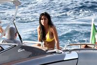 Nicole Scherzinger in a sexy bikini on a boat in Capri showing her ass and nice cleavage seen by paparazzi.












