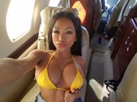 CJ Miles in a bikini taking a selfie