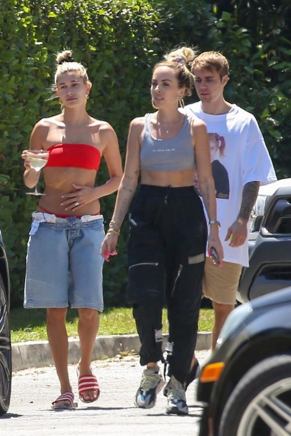 Hailey Baldwin Bieber in a sexy red bikini out with Justin Bieber seen by paparazzi.




